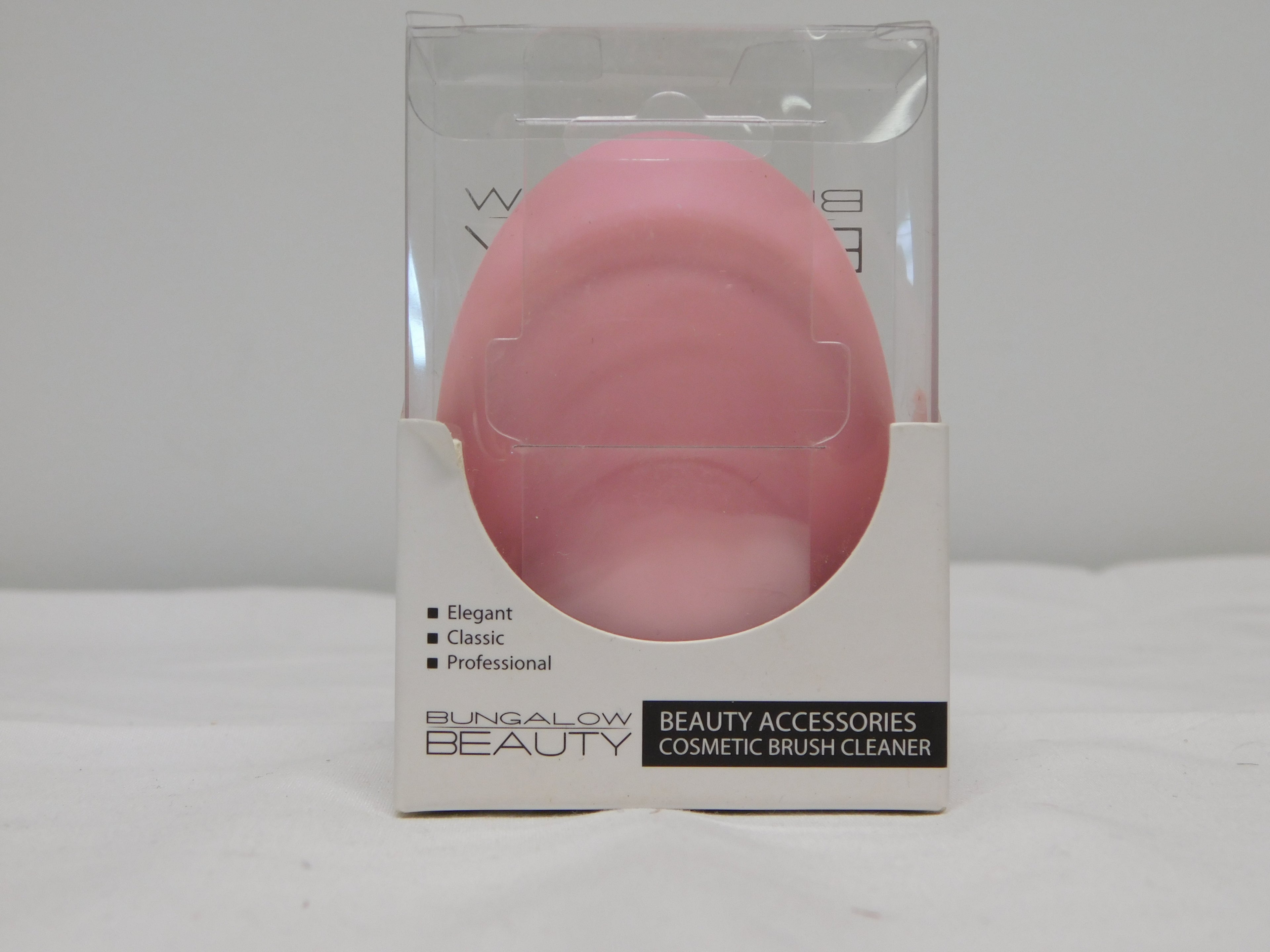 Egg shaped cosmetic brush cleaner
