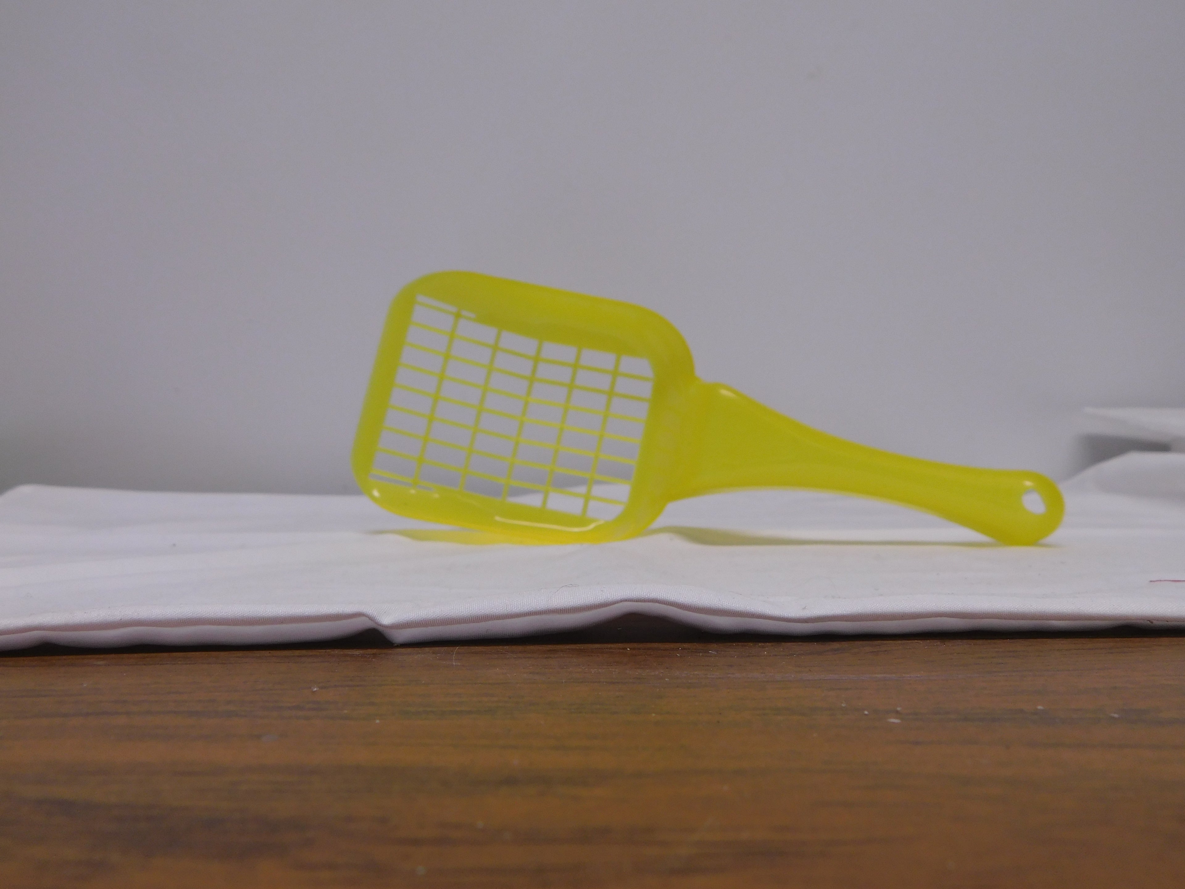 Yellow Plastic Scoop