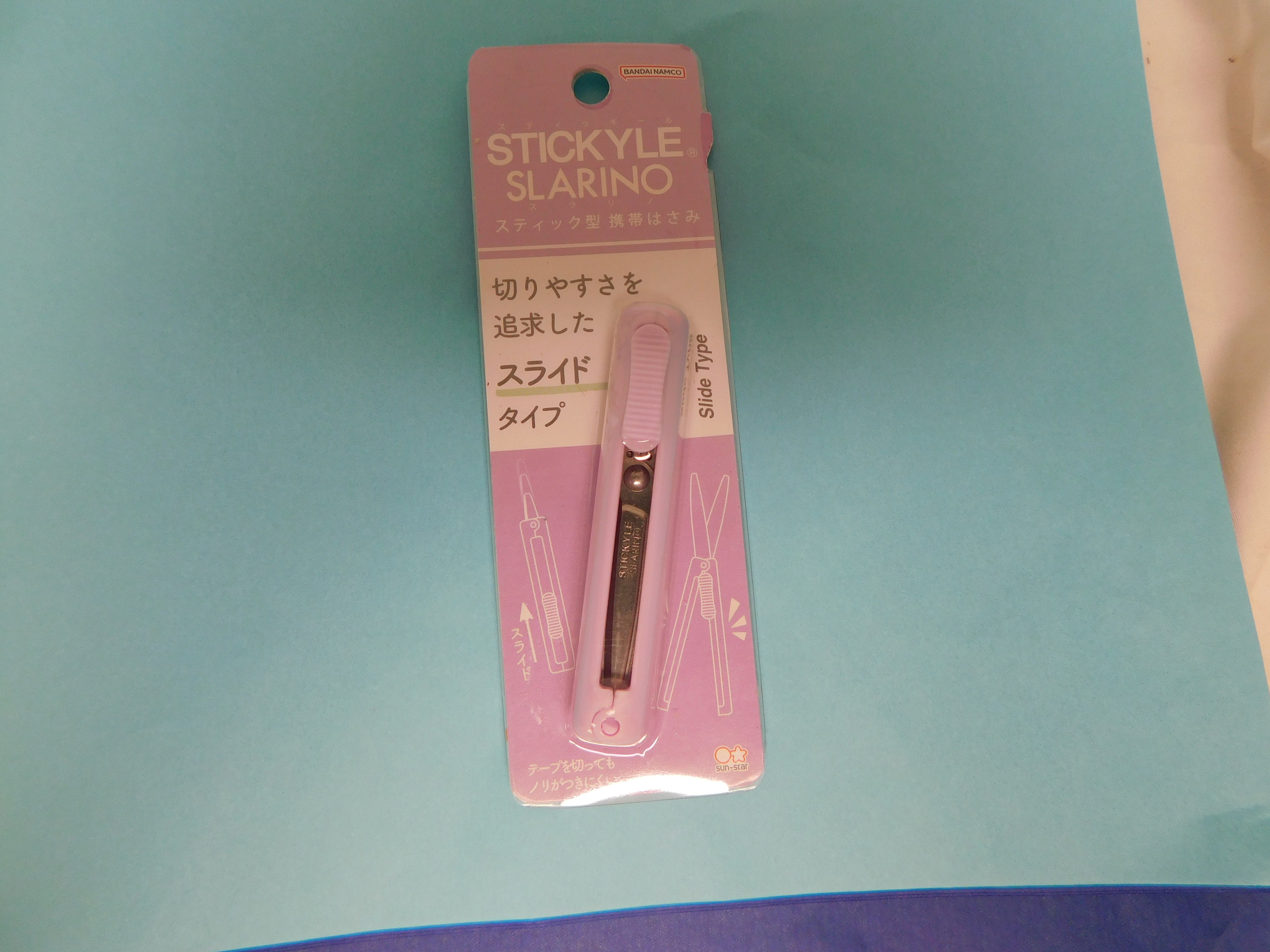 Purple slide open scissors