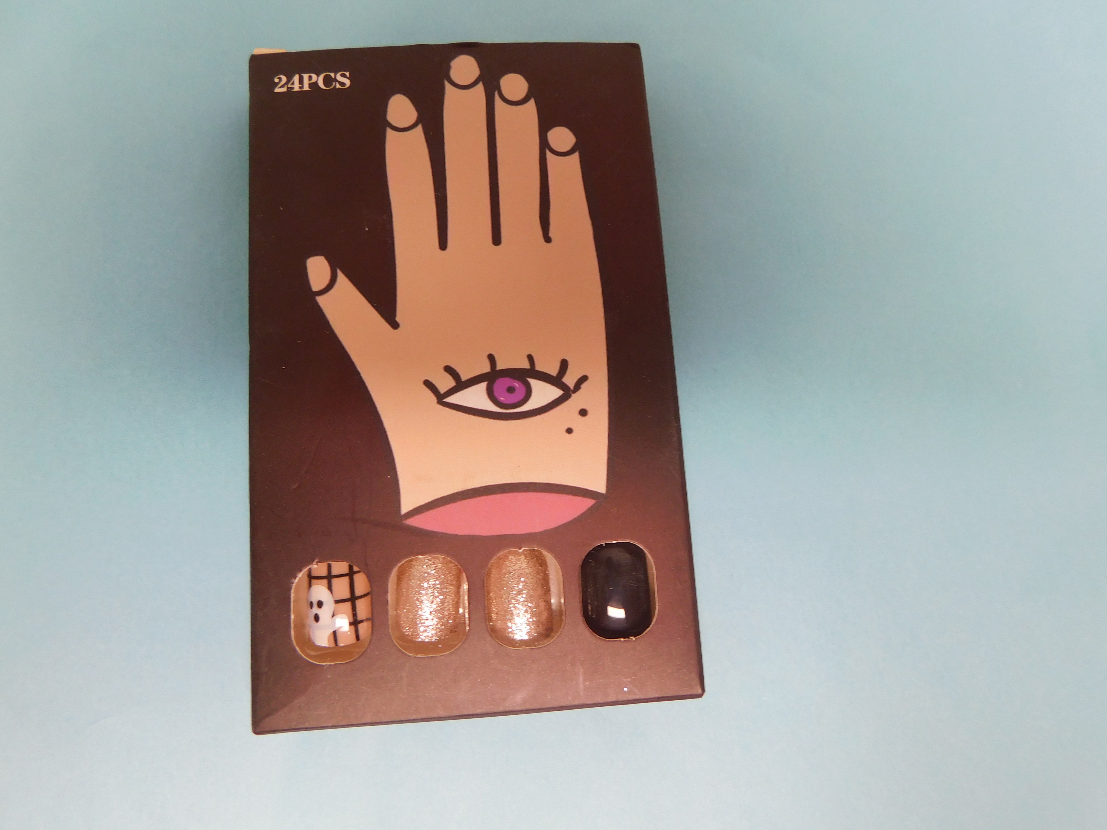 Press On Nails with a ghost